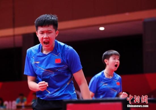 資料圖：雅加達亞運會，王楚欽/孫穎莎奪得混雙冠軍。 <a target='_blank' href='/'>中新社</a>記者 劉關(guān)關(guān) 攝