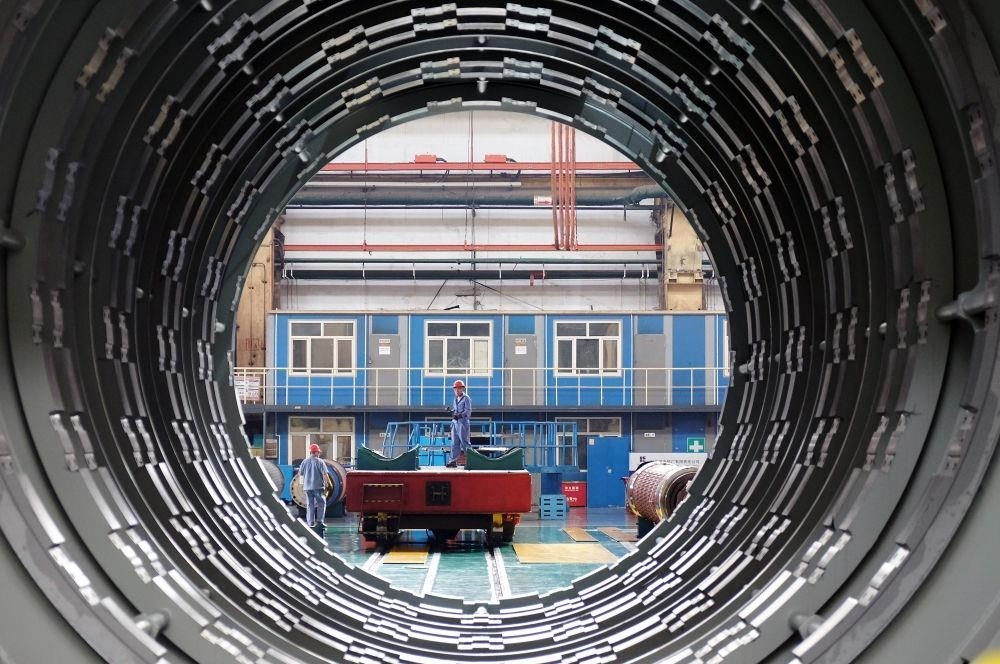 △2023年8月31日，工人在哈電集團哈爾濱電機廠有限責任公司的水電分廠重型車間作業(yè)。